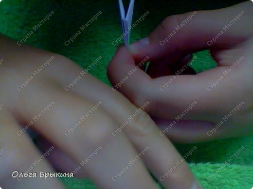 Возьмите еще 1-н модуль и положите его короткой стороной наверх. Мы видем 2 кармашка один из них ведет направо, другой налево. (фото 14)