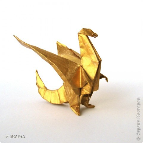 <strong>Drache</strong> © Modell: J?zsef Zsebe
Paper: square 21 cm
Final height: ~ 8 cm
<a href="http://origami-deutschland.com/anleitungen.htm" target="_blank">Diagram</a> (фото 5)