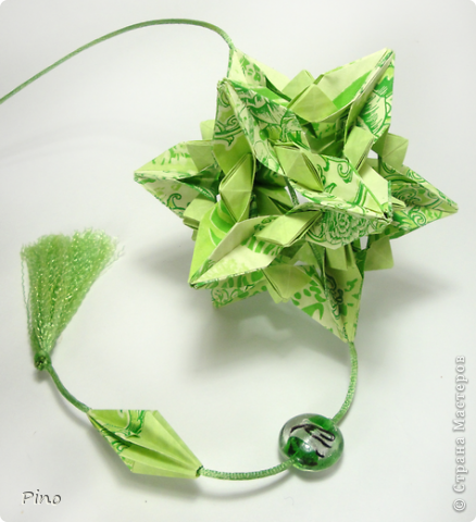 Xenia, автор - Anna Larionova
схема -  http://ru-kusudama.livejournal.com/878864.html
http://www.flickr.com/photos/42133690@N04/sets/72157622659507650/
на обвесе - https://podjem-tal.ru/node/237485 (фото 5)