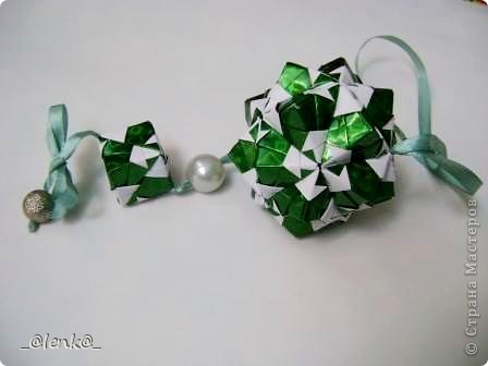 Кусудама "Double Whirligig".
Бумага: 6х6 см
Диаметр: 6.5 см
http://kusudama.info/2011/11/sonobe-variation-2/ (фото 7)