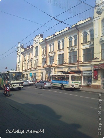 Город Томск славится своей архитектурой. Больше всего, в окрасе домов преобладают пастельные тона. (фото 2)