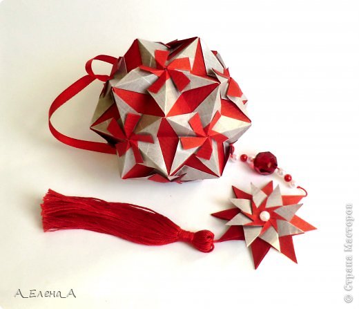 На обвесе - Mandala Carla Марии Синайской.
Схема звезды http://goorigami.com/modular-origami/mandala-carla/4043  (фото 7)