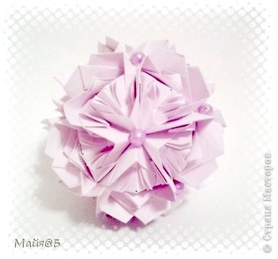 Name: Fluffy Rose
Designer: Natalia Romanenko
(inspired by Maria Sinayskaya’s Royal Rose)
Units: 30
Paper: 7,5*12,5 cm (3:5) 
Final height: ~ 9 cm
http://kusudama.info/2013/08/fluffy-rose-tutorial/