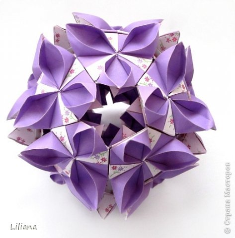 Lilofeya
Designer: Uniya Filonova
Units: 30
Paper: 5*14,4 cm (1:2,88)
Final height: ~ 11 cm
Joint: no glue

https://podjem-tal.ru/node/650613?c=new_850%2C451 (фото 5)