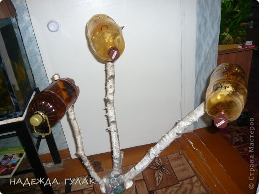 бутылки 2,5 л. разрезала  это для  того что-бы мордочки покороче получились,потом соединила опять в месте. (фото 3)