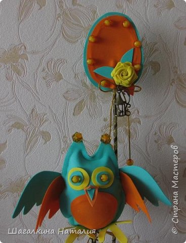 Немного бусинок, ленточек, "золотой" верёвочки , пара металлических клеточек, и всё готово. (фото 3)