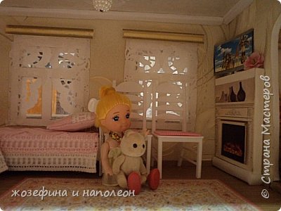 Ну вот и жилец. Жарко топится камин. На полу ковер. Тепло и уютно (фото 9)
