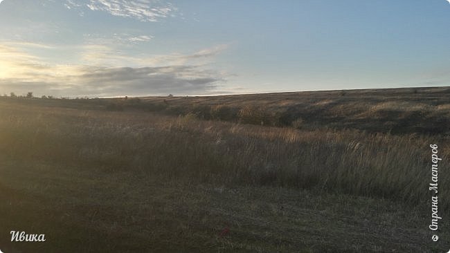 Серенькая степь и облачка в лучиках солнца. (фото 7)