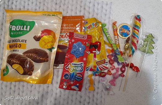 И я к вам с хвостом по этой же игре. Вторая посылка пришла от Елены  Остапюк

Очень много сладостей, вкусностей  (фото 4)
