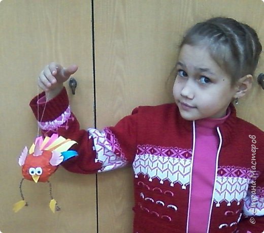 Вот какой получился! В гребешок продета ниточка, и игрушку можно повесить на елку. (фото 11)